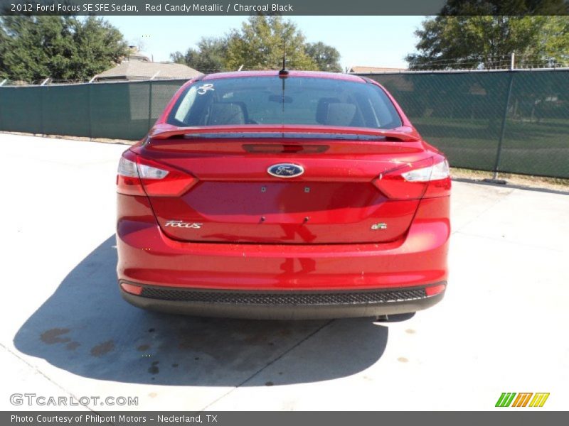 Red Candy Metallic / Charcoal Black 2012 Ford Focus SE SFE Sedan