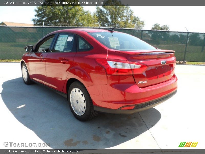 Red Candy Metallic / Charcoal Black 2012 Ford Focus SE SFE Sedan
