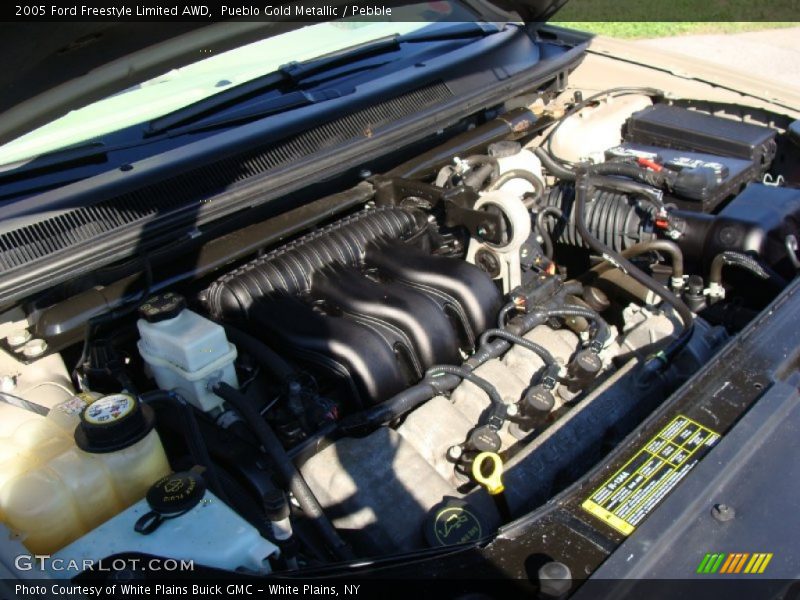 Pueblo Gold Metallic / Pebble 2005 Ford Freestyle Limited AWD