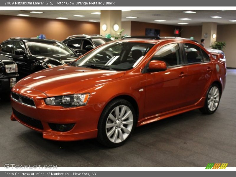 Rotor Glow Orange Metallic / Black 2009 Mitsubishi Lancer GTS