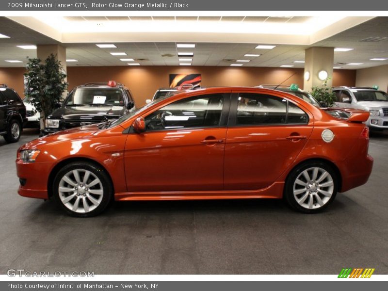 Rotor Glow Orange Metallic / Black 2009 Mitsubishi Lancer GTS