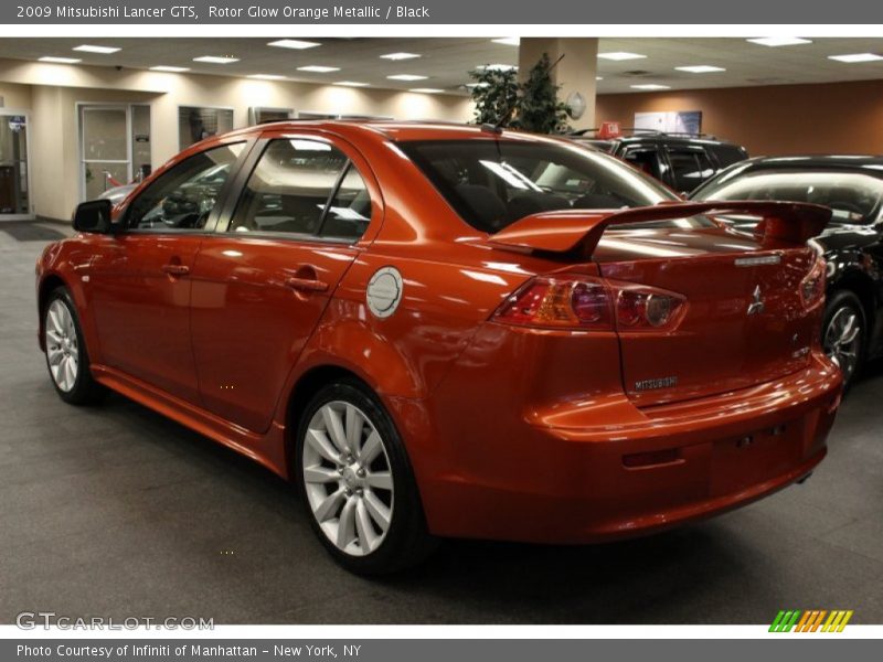 Rotor Glow Orange Metallic / Black 2009 Mitsubishi Lancer GTS