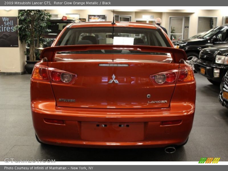 Rotor Glow Orange Metallic / Black 2009 Mitsubishi Lancer GTS