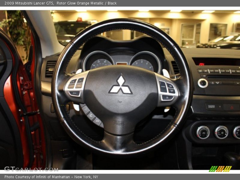 Rotor Glow Orange Metallic / Black 2009 Mitsubishi Lancer GTS