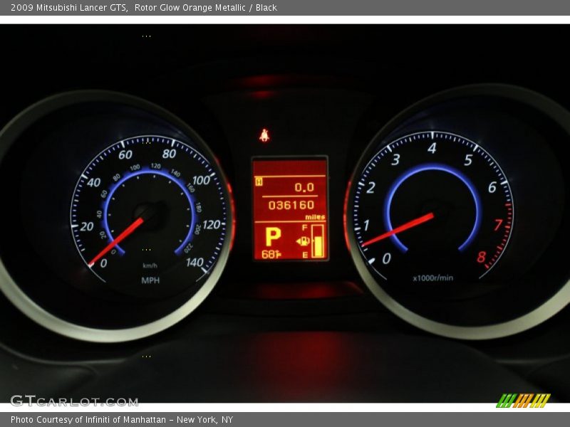 Rotor Glow Orange Metallic / Black 2009 Mitsubishi Lancer GTS