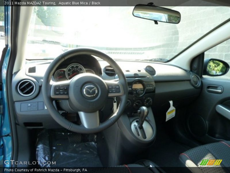 Dashboard of 2011 MAZDA2 Touring