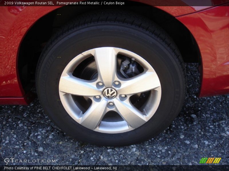 Pomegranate Red Metallic / Ceylon Beige 2009 Volkswagen Routan SEL