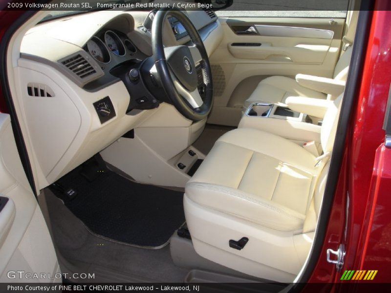 Pomegranate Red Metallic / Ceylon Beige 2009 Volkswagen Routan SEL