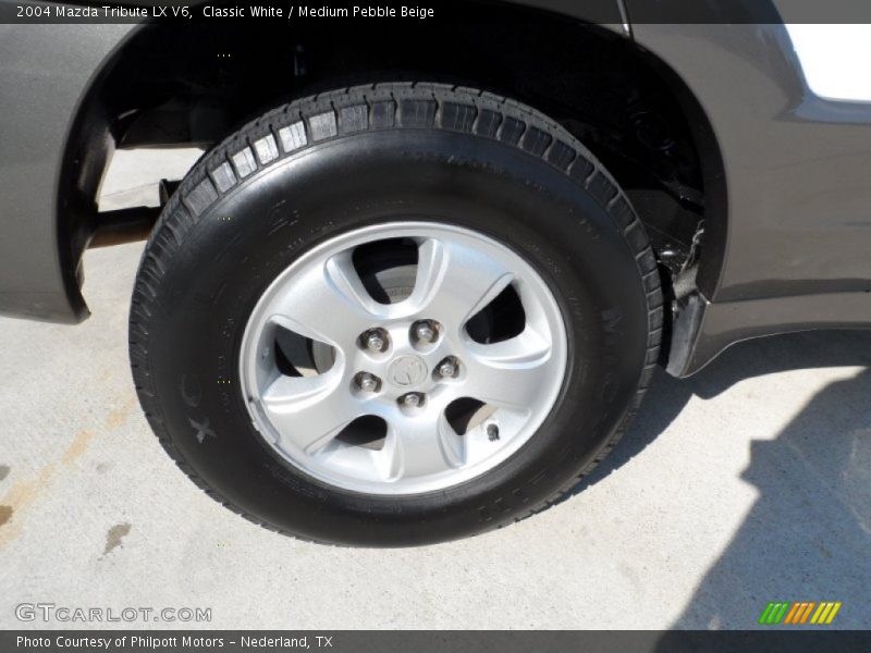  2004 Tribute LX V6 Wheel
