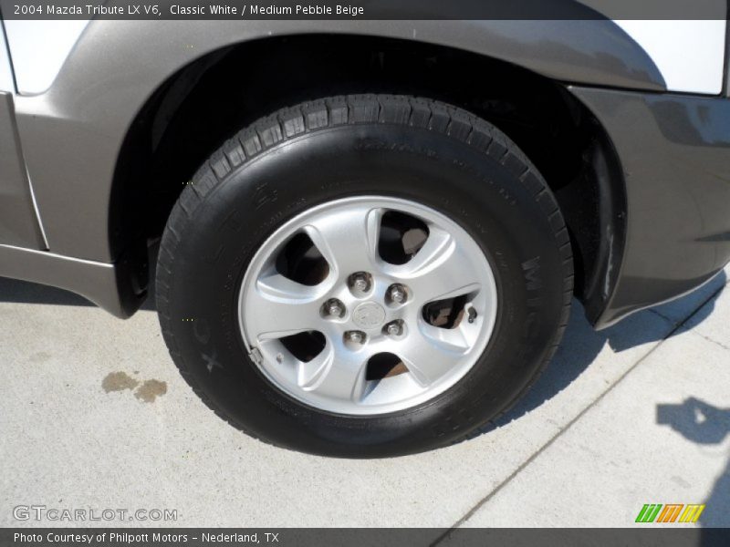  2004 Tribute LX V6 Wheel
