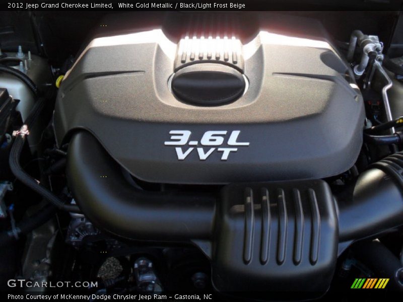 White Gold Metallic / Black/Light Frost Beige 2012 Jeep Grand Cherokee Limited