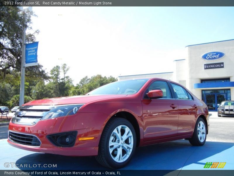 Red Candy Metallic / Medium Light Stone 2012 Ford Fusion SE