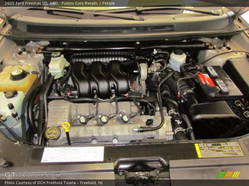 Pueblo Gold Metallic / Pebble 2005 Ford Freestyle SEL AWD
