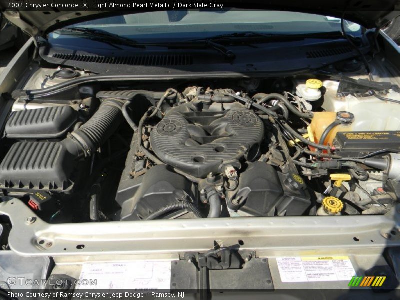 Light Almond Pearl Metallic / Dark Slate Gray 2002 Chrysler Concorde LX