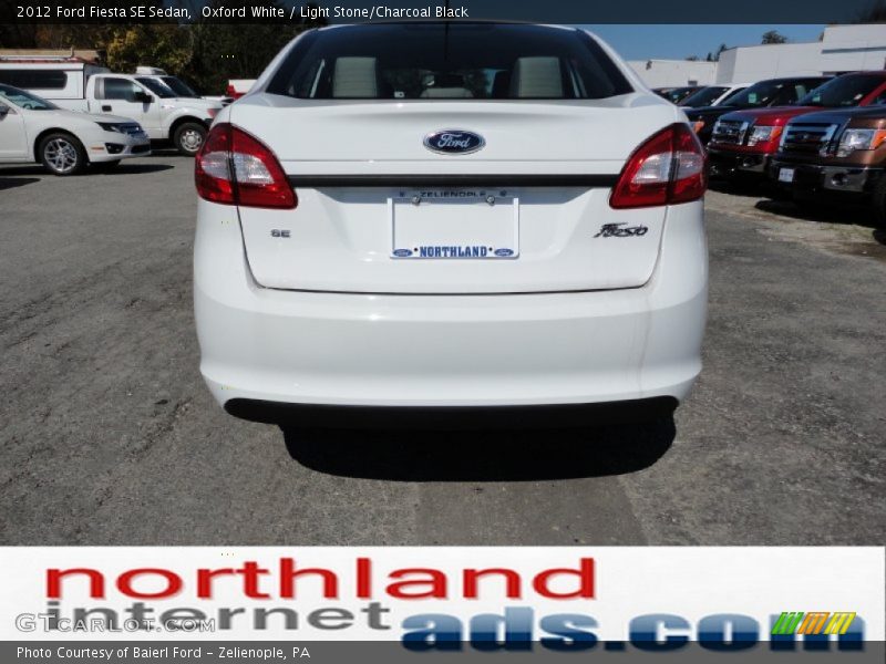 Oxford White / Light Stone/Charcoal Black 2012 Ford Fiesta SE Sedan