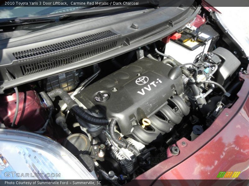 Carmine Red Metallic / Dark Charcoal 2010 Toyota Yaris 3 Door Liftback