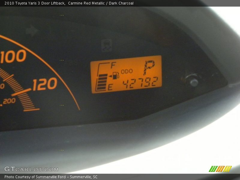 Carmine Red Metallic / Dark Charcoal 2010 Toyota Yaris 3 Door Liftback