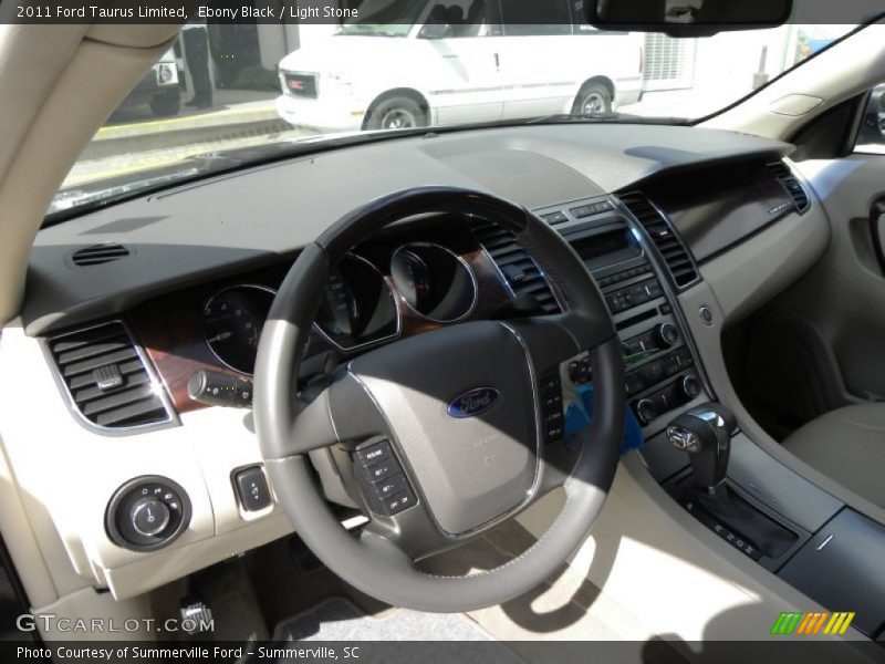 Ebony Black / Light Stone 2011 Ford Taurus Limited