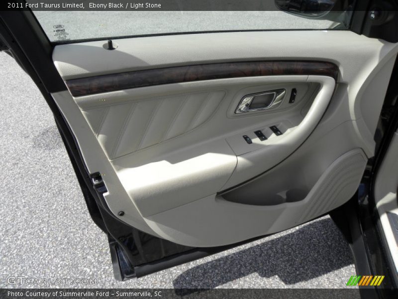 Ebony Black / Light Stone 2011 Ford Taurus Limited
