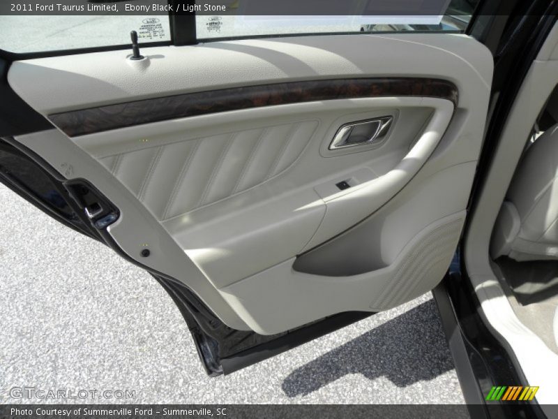Ebony Black / Light Stone 2011 Ford Taurus Limited