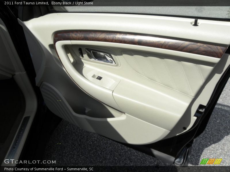Ebony Black / Light Stone 2011 Ford Taurus Limited