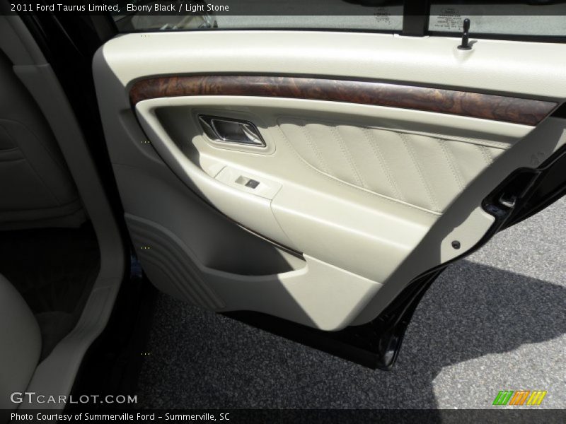 Ebony Black / Light Stone 2011 Ford Taurus Limited
