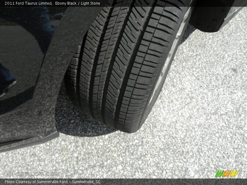 Ebony Black / Light Stone 2011 Ford Taurus Limited