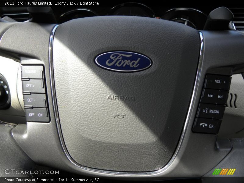 Ebony Black / Light Stone 2011 Ford Taurus Limited