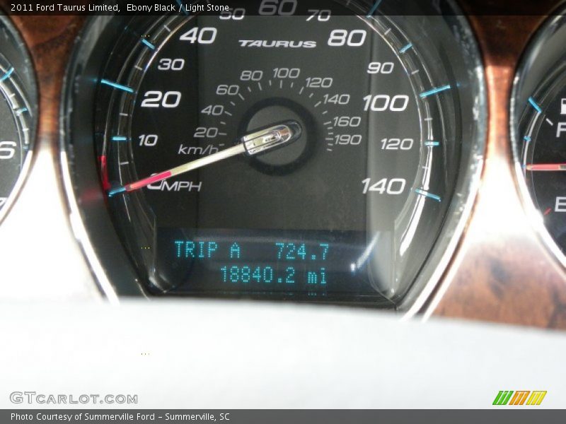 Ebony Black / Light Stone 2011 Ford Taurus Limited