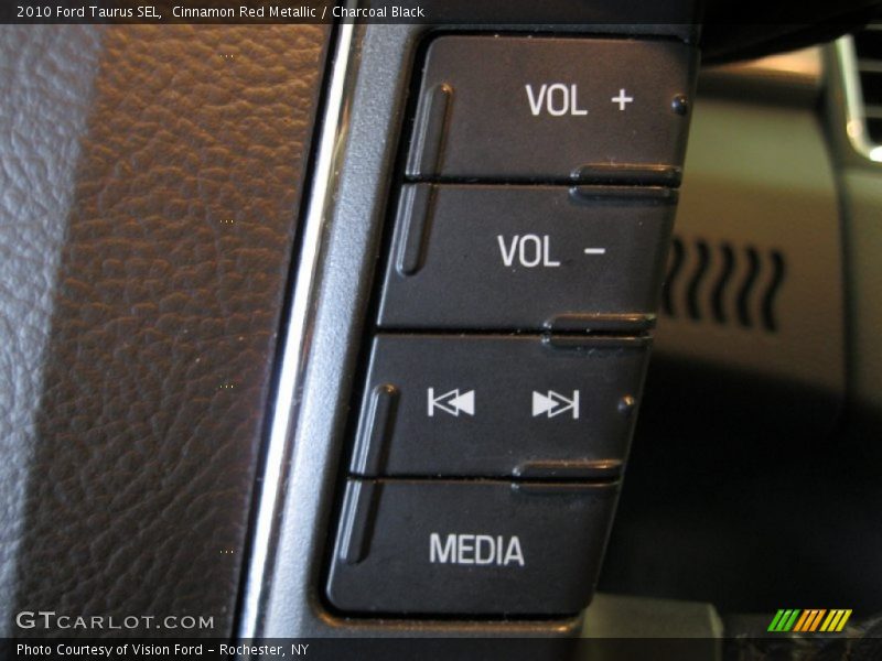 Cinnamon Red Metallic / Charcoal Black 2010 Ford Taurus SEL