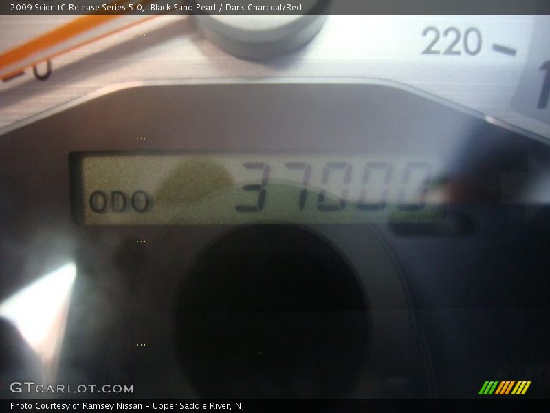 Black Sand Pearl / Dark Charcoal/Red 2009 Scion tC Release Series 5.0