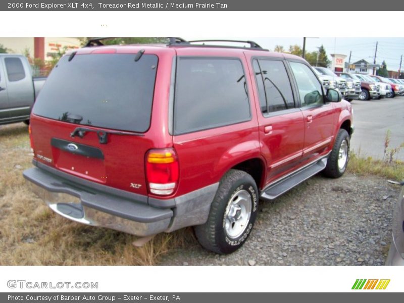 Toreador Red Metallic / Medium Prairie Tan 2000 Ford Explorer XLT 4x4