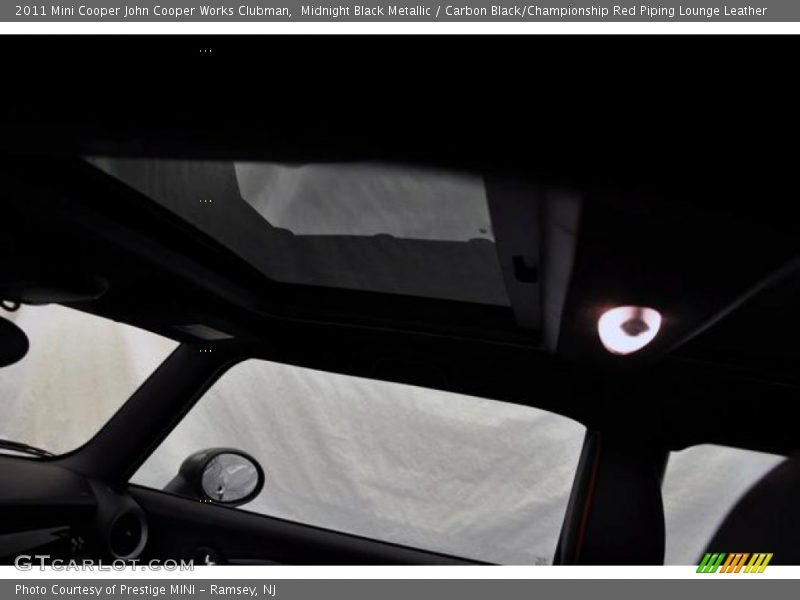 Midnight Black Metallic / Carbon Black/Championship Red Piping Lounge Leather 2011 Mini Cooper John Cooper Works Clubman
