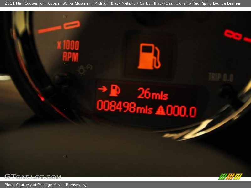 Midnight Black Metallic / Carbon Black/Championship Red Piping Lounge Leather 2011 Mini Cooper John Cooper Works Clubman