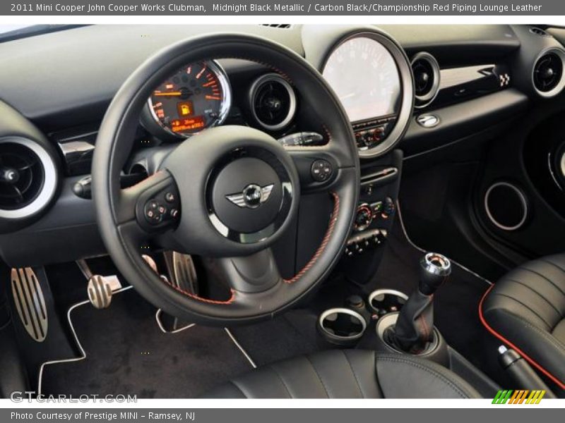  2011 Cooper John Cooper Works Clubman Carbon Black/Championship Red Piping Lounge Leather Interior