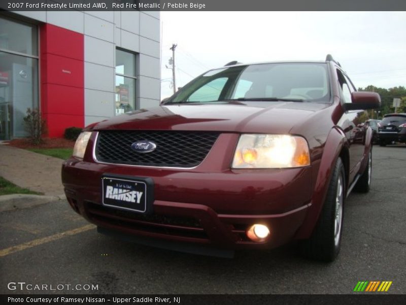Red Fire Metallic / Pebble Beige 2007 Ford Freestyle Limited AWD