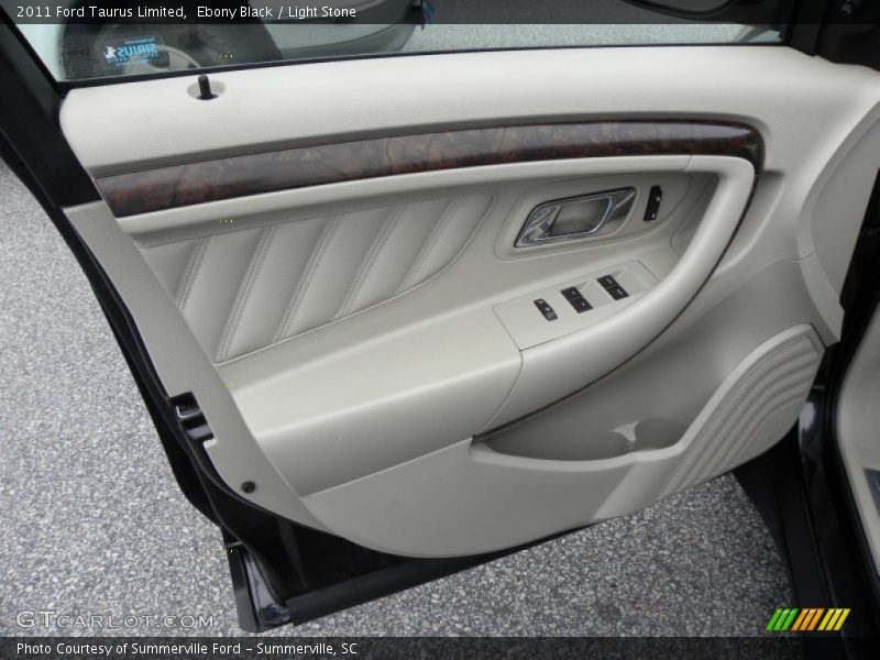 Ebony Black / Light Stone 2011 Ford Taurus Limited