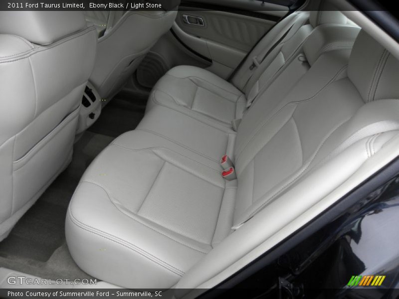 Ebony Black / Light Stone 2011 Ford Taurus Limited