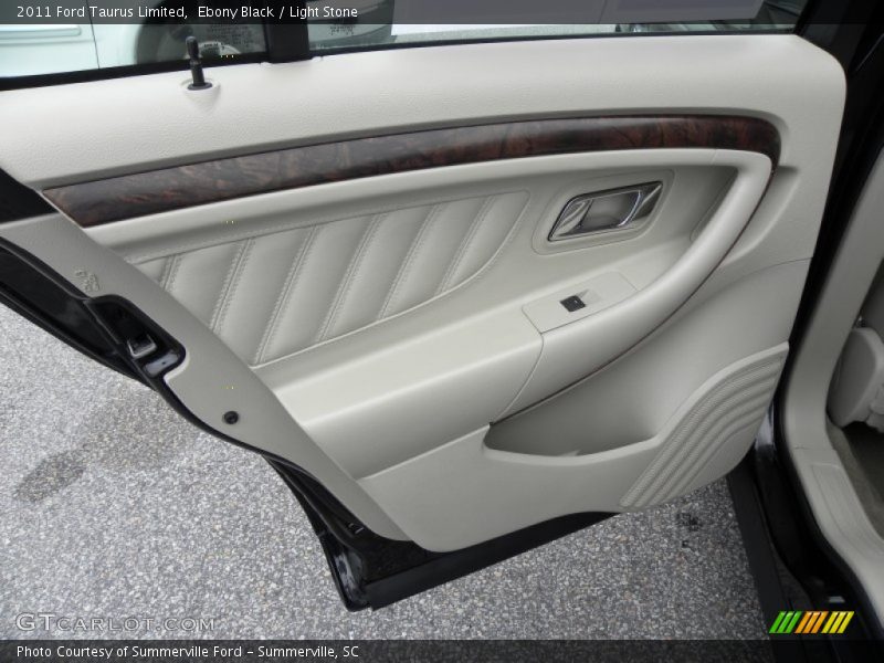 Ebony Black / Light Stone 2011 Ford Taurus Limited
