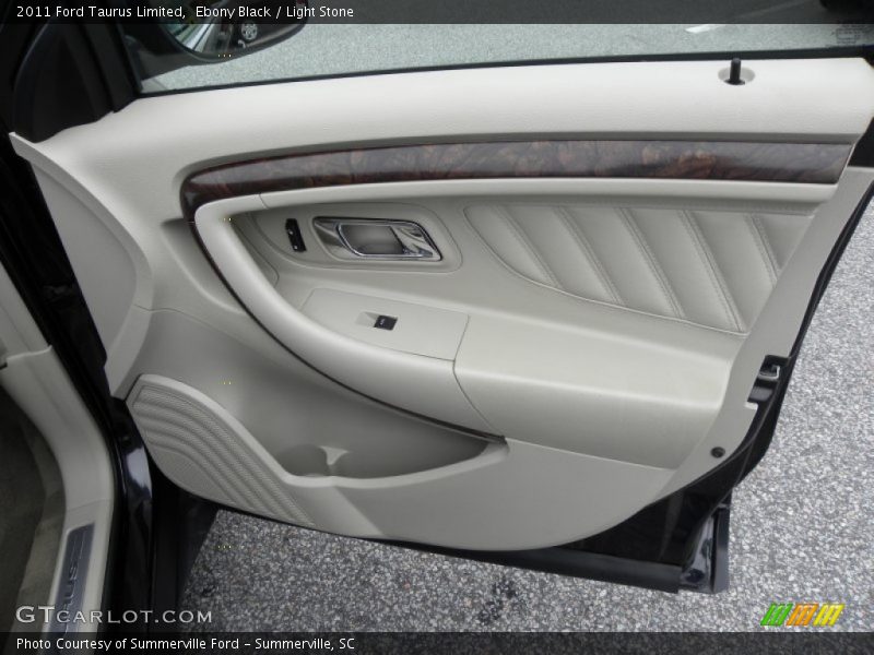 Ebony Black / Light Stone 2011 Ford Taurus Limited