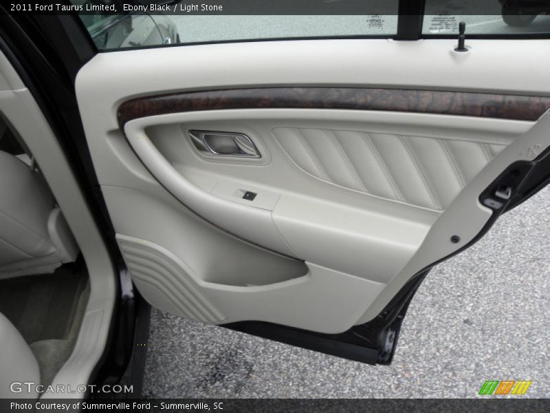 Ebony Black / Light Stone 2011 Ford Taurus Limited