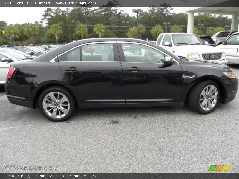 Ebony Black / Light Stone 2011 Ford Taurus Limited