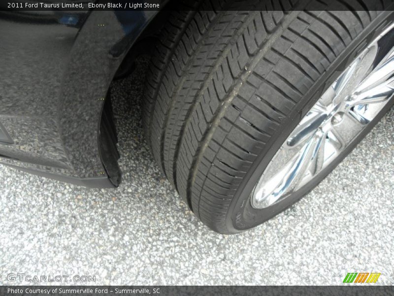 Ebony Black / Light Stone 2011 Ford Taurus Limited