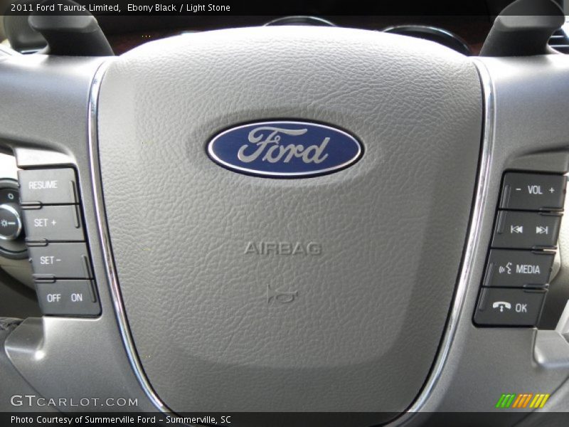 Ebony Black / Light Stone 2011 Ford Taurus Limited