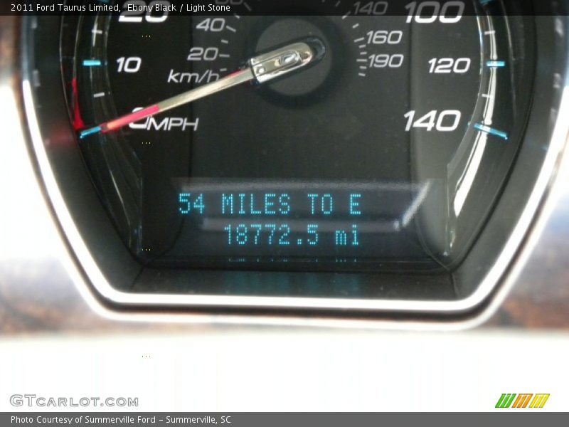Ebony Black / Light Stone 2011 Ford Taurus Limited