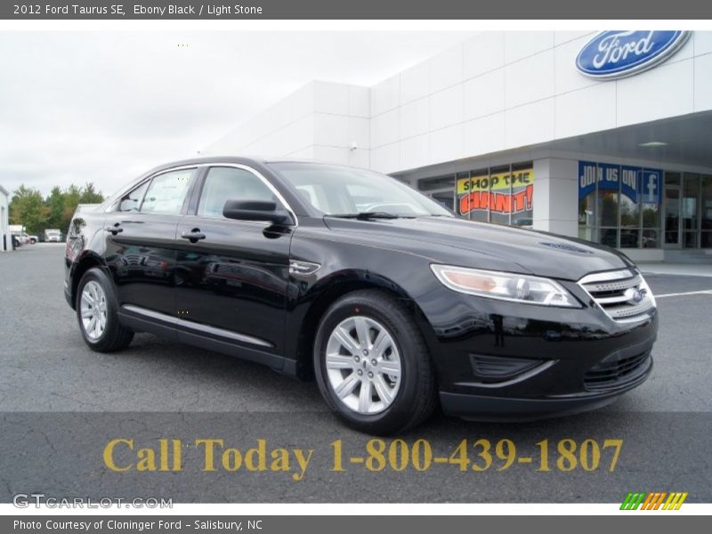 Ebony Black / Light Stone 2012 Ford Taurus SE