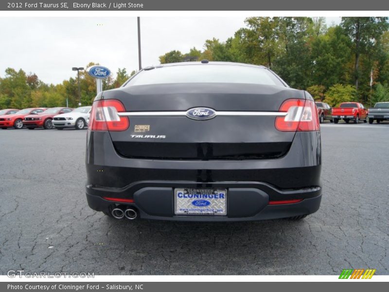 Ebony Black / Light Stone 2012 Ford Taurus SE