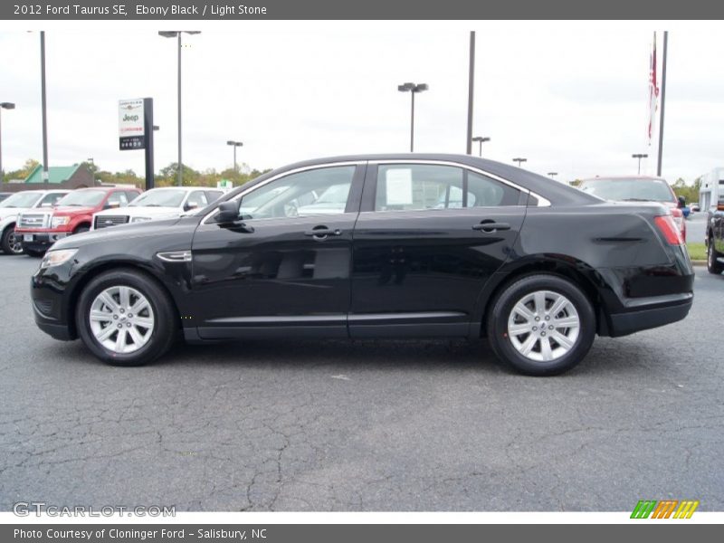 Ebony Black / Light Stone 2012 Ford Taurus SE