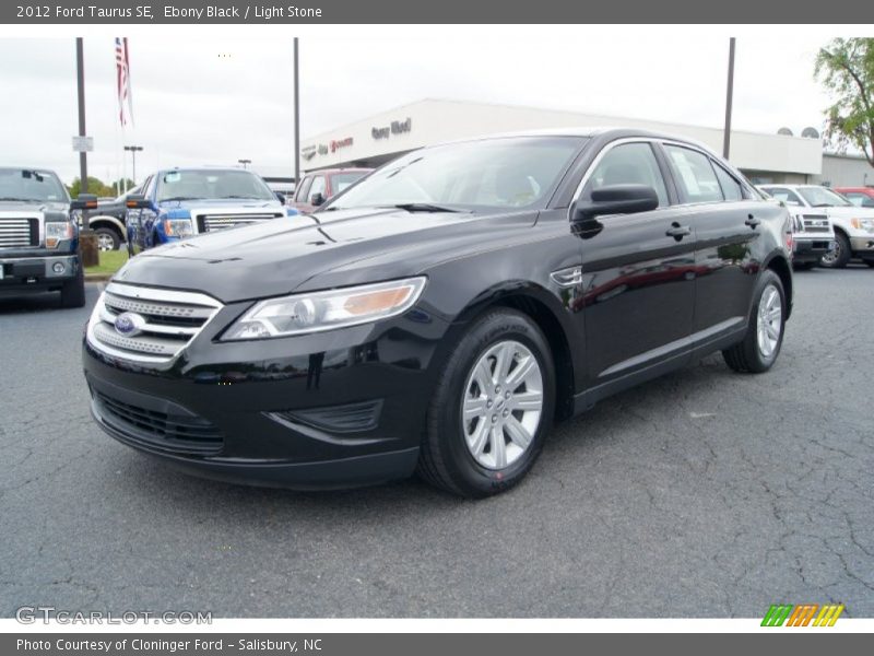 Ebony Black / Light Stone 2012 Ford Taurus SE