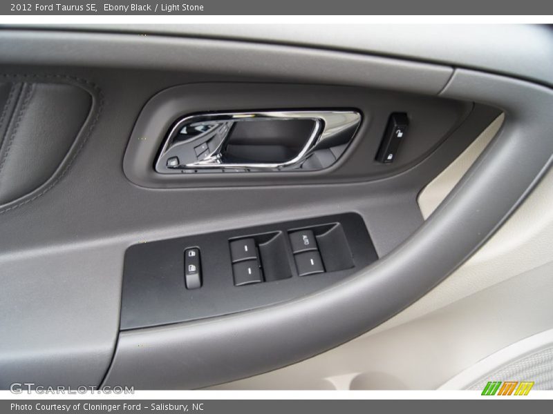 Ebony Black / Light Stone 2012 Ford Taurus SE